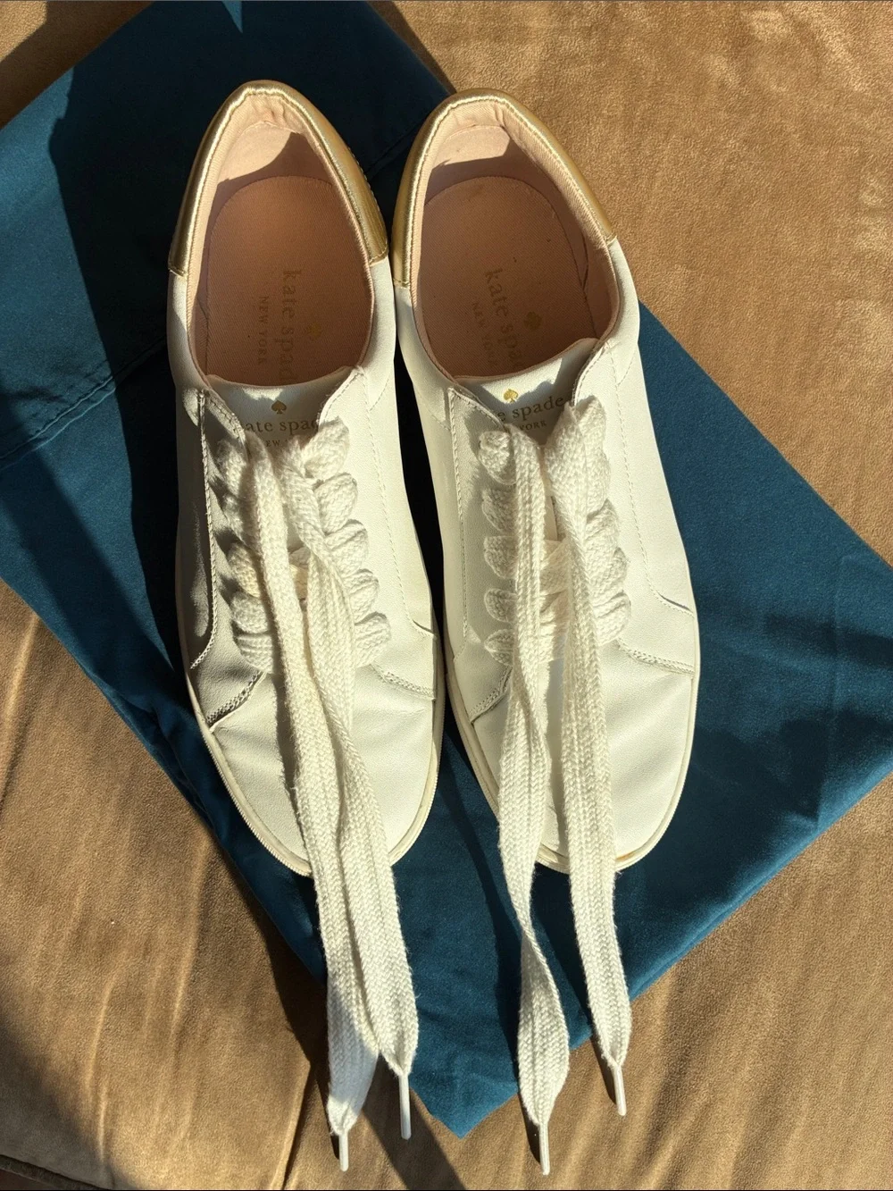 kate spade white leather low-top sneakers with gold heel accent